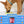 Dog eating from a lick mat with product information below